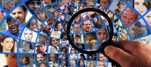 Picture of a magnifying glass looking at marketing avatars for campaigns