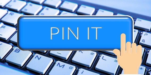 Keyboard with pin it overlaid on top for using pinterest for social media marketing