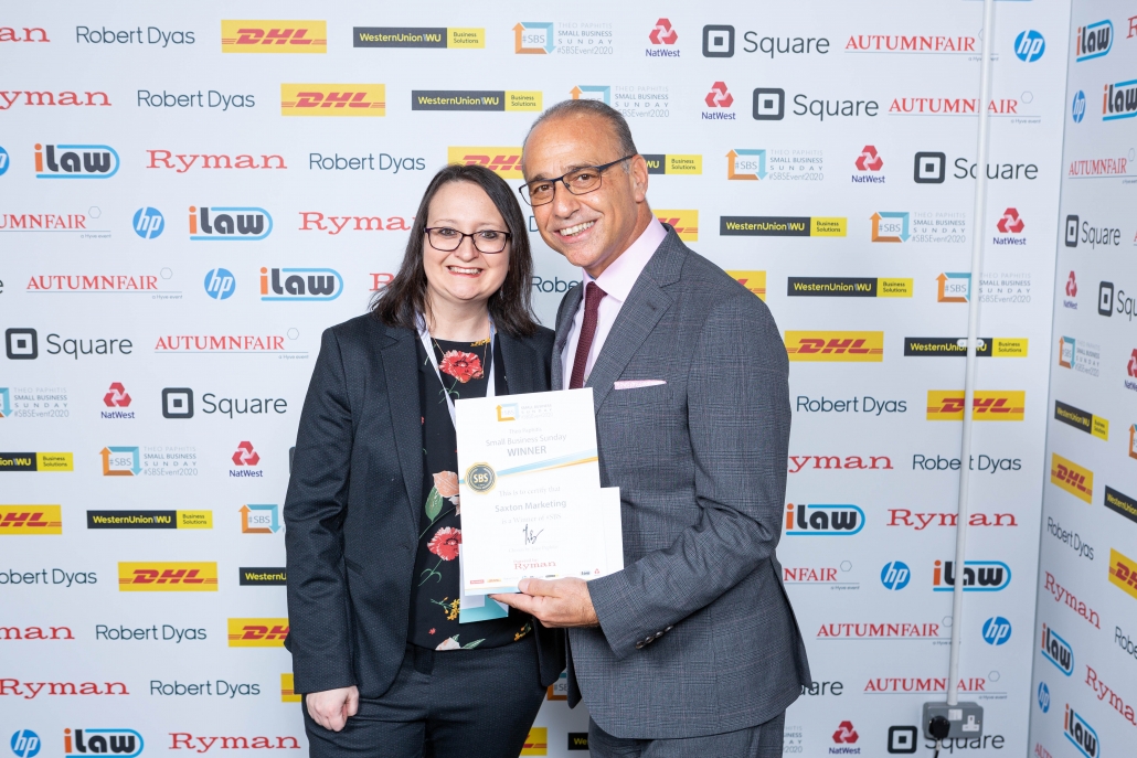 Photograph of Claire Saxton with Theo Paphitis receiving her SBS certificate