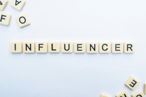 Influencer written with scrabble tiles because this blog is about influencer marketing