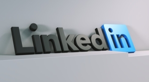 A 3D model of the LinkedIn logo against a grey background