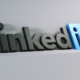 A 3D model of the LinkedIn logo against a grey background